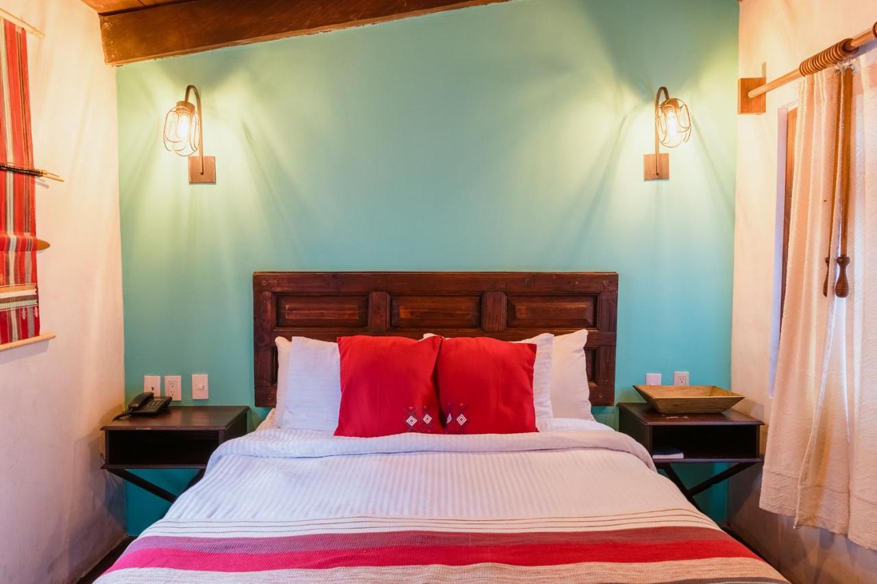 Yox Hotel Boutique San Cristóbal de Las Casas Eksteriør billede A bedroom at the hotel